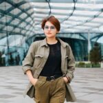Stylish asian woman with short haircut wearing fashion glasses